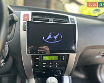 Черный Хендай Туксон, объемом двигателя 2 л и пробегом 218 тыс. км за 8700 $, фото 28 на Automoto.ua