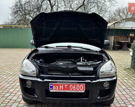 Чорний Хендай Туксон, об'ємом двигуна 2 л та пробігом 182 тис. км за 8299 $, фото 40 на Automoto.ua