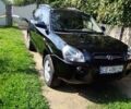 Чорний Хендай Туксон, об'ємом двигуна 1.98 л та пробігом 224 тис. км за 8000 $, фото 7 на Automoto.ua