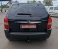 Черный Хендай Туксон, объемом двигателя 2 л и пробегом 255 тыс. км за 8700 $, фото 15 на Automoto.ua