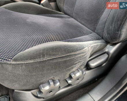 Черный Хендай Туксон, объемом двигателя 2 л и пробегом 137 тыс. км за 8400 $, фото 27 на Automoto.ua