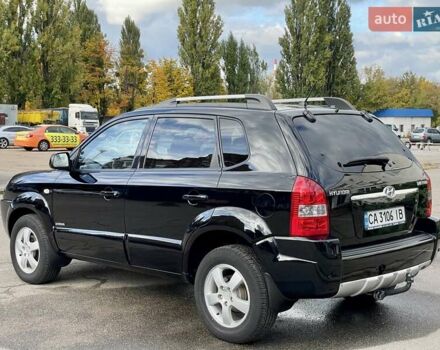 Черный Хендай Туксон, объемом двигателя 1.98 л и пробегом 172 тыс. км за 8500 $, фото 8 на Automoto.ua