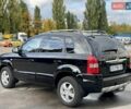 Черный Хендай Туксон, объемом двигателя 1.98 л и пробегом 172 тыс. км за 8500 $, фото 8 на Automoto.ua