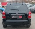 Чорний Хендай Туксон, об'ємом двигуна 2 л та пробігом 192 тис. км за 7990 $, фото 7 на Automoto.ua