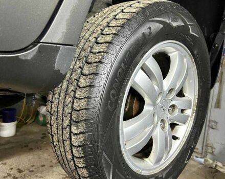 Черный Хендай Туксон, объемом двигателя 2 л и пробегом 220 тыс. км за 7000 $, фото 6 на Automoto.ua