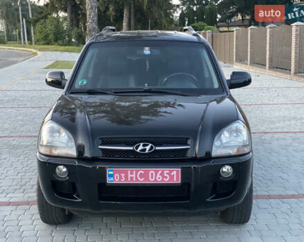 Черный Хендай Туксон, объемом двигателя 2 л и пробегом 250 тыс. км за 7950 $, фото 41 на Automoto.ua
