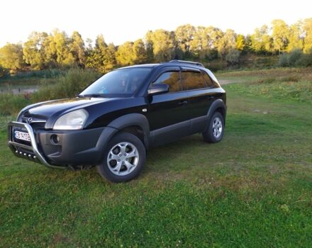 Черный Хендай Туксон, объемом двигателя 2 л и пробегом 162 тыс. км за 8500 $, фото 2 на Automoto.ua
