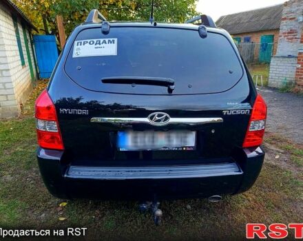 Черный Хендай Туксон, объемом двигателя 2 л и пробегом 187 тыс. км за 7900 $, фото 1 на Automoto.ua
