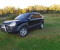 Черный Хендай Туксон, объемом двигателя 2 л и пробегом 162 тыс. км за 8500 $, фото 2 на Automoto.ua