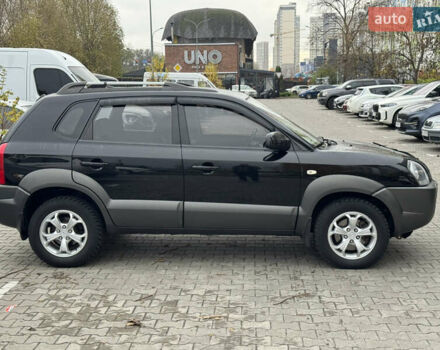 Черный Хендай Туксон, объемом двигателя 2 л и пробегом 157 тыс. км за 8900 $, фото 1 на Automoto.ua