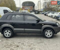 Черный Хендай Туксон, объемом двигателя 2 л и пробегом 157 тыс. км за 8900 $, фото 1 на Automoto.ua