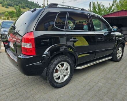 Черный Хендай Туксон, объемом двигателя 2 л и пробегом 287 тыс. км за 2400 $, фото 2 на Automoto.ua