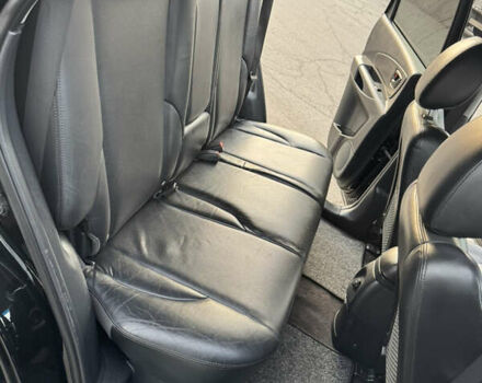 Черный Хендай Туксон, объемом двигателя 2 л и пробегом 210 тыс. км за 7850 $, фото 34 на Automoto.ua