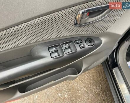 Чорний Хендай Туксон, об'ємом двигуна 1.98 л та пробігом 176 тис. км за 8500 $, фото 13 на Automoto.ua