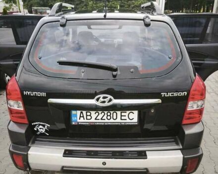 Черный Хендай Туксон, объемом двигателя 1.98 л и пробегом 189 тыс. км за 7800 $, фото 11 на Automoto.ua