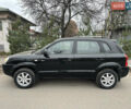 Черный Хендай Туксон, объемом двигателя 2 л и пробегом 136 тыс. км за 8500 $, фото 4 на Automoto.ua