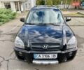 Черный Хендай Туксон, объемом двигателя 1.98 л и пробегом 172 тыс. км за 8500 $, фото 13 на Automoto.ua