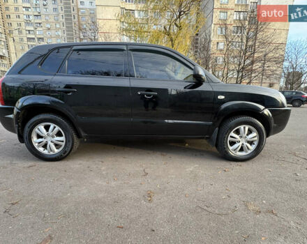 Черный Хендай Туксон, объемом двигателя 1.98 л и пробегом 196 тыс. км за 7999 $, фото 9 на Automoto.ua