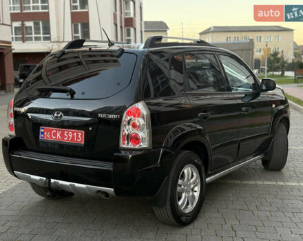 Чорний Хендай Туксон, об'ємом двигуна 2 л та пробігом 156 тис. км за 7850 $, фото 23 на Automoto.ua