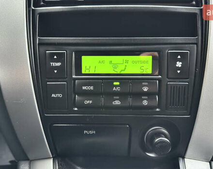 Чорний Хендай Туксон, об'ємом двигуна 2 л та пробігом 182 тис. км за 8299 $, фото 64 на Automoto.ua