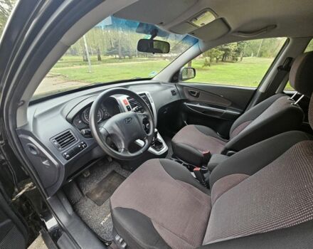 Чорний Хендай Туксон, об'ємом двигуна 2 л та пробігом 186 тис. км за 8300 $, фото 11 на Automoto.ua