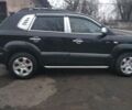 Черный Хендай Туксон, объемом двигателя 2 л и пробегом 270 тыс. км за 8050 $, фото 1 на Automoto.ua