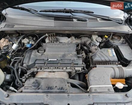 Черный Хендай Туксон, объемом двигателя 2 л и пробегом 182 тыс. км за 9000 $, фото 14 на Automoto.ua