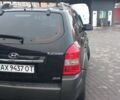 Черный Хендай Туксон, объемом двигателя 2 л и пробегом 200 тыс. км за 8300 $, фото 5 на Automoto.ua