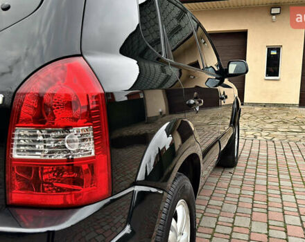 Чорний Хендай Туксон, об'ємом двигуна 2 л та пробігом 182 тис. км за 8299 $, фото 6 на Automoto.ua