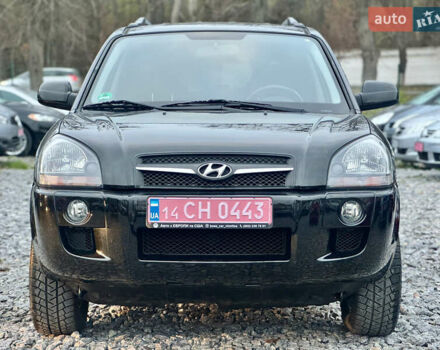 Черный Хендай Туксон, объемом двигателя 1.98 л и пробегом 96 тыс. км за 9900 $, фото 2 на Automoto.ua