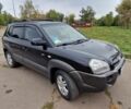 Черный Хендай Туксон, объемом двигателя 2 л и пробегом 193 тыс. км за 8100 $, фото 7 на Automoto.ua