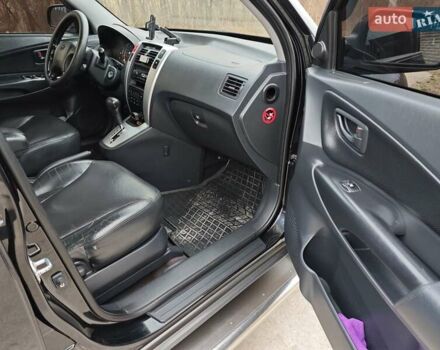 Черный Хендай Туксон, объемом двигателя 2 л и пробегом 182 тыс. км за 9000 $, фото 10 на Automoto.ua