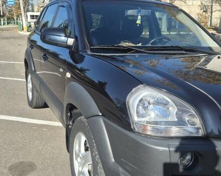 Черный Хендай Туксон, объемом двигателя 1.98 л и пробегом 93 тыс. км за 11800 $, фото 5 на Automoto.ua