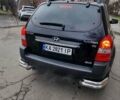 Черный Хендай Туксон, объемом двигателя 2.66 л и пробегом 311 тыс. км за 7200 $, фото 5 на Automoto.ua