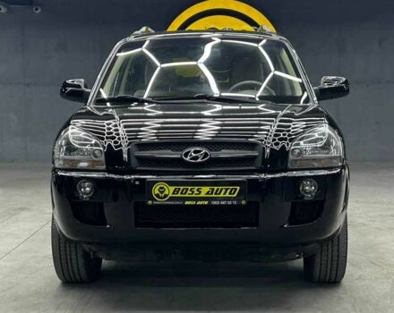 Черный Хендай Туксон, объемом двигателя 2 л и пробегом 224 тыс. км за 7800 $, фото 1 на Automoto.ua