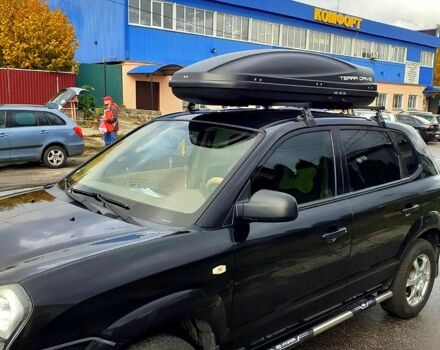 Черный Хендай Туксон, объемом двигателя 2 л и пробегом 240 тыс. км за 7500 $, фото 1 на Automoto.ua