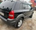 Черный Хендай Туксон, объемом двигателя 1.98 л и пробегом 290 тыс. км за 7000 $, фото 5 на Automoto.ua