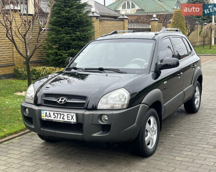 Черный Хендай Туксон, объемом двигателя 2 л и пробегом 107 тыс. км за 8900 $, фото 1 на Automoto.ua