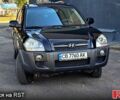 Черный Хендай Туксон, объемом двигателя 2 л и пробегом 215 тыс. км за 8350 $, фото 1 на Automoto.ua