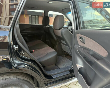 Чорний Хендай Туксон, об'ємом двигуна 2 л та пробігом 156 тис. км за 7850 $, фото 31 на Automoto.ua