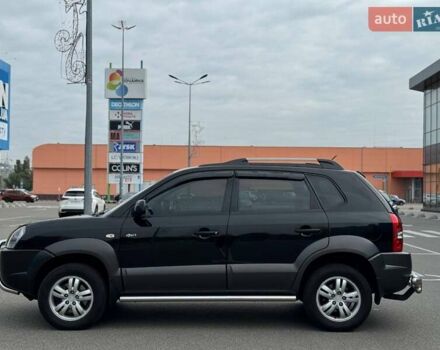 Черный Хендай Туксон, объемом двигателя 1.98 л и пробегом 202 тыс. км за 8350 $, фото 2 на Automoto.ua