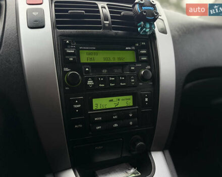 Черный Хендай Туксон, объемом двигателя 2 л и пробегом 252 тыс. км за 7200 $, фото 22 на Automoto.ua