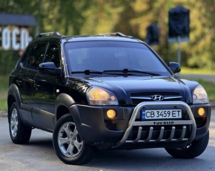 Чорний Хендай Туксон, об'ємом двигуна 2 л та пробігом 207 тис. км за 7600 $, фото 1 на Automoto.ua