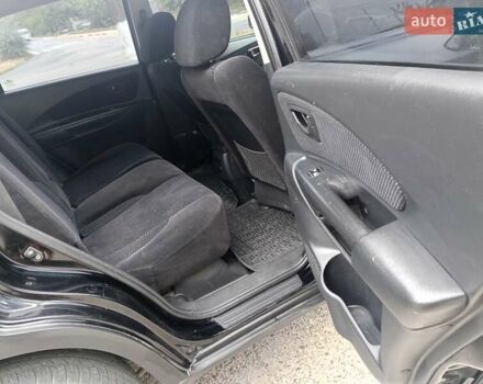 Черный Хендай Туксон, объемом двигателя 1.98 л и пробегом 157 тыс. км за 7500 $, фото 14 на Automoto.ua