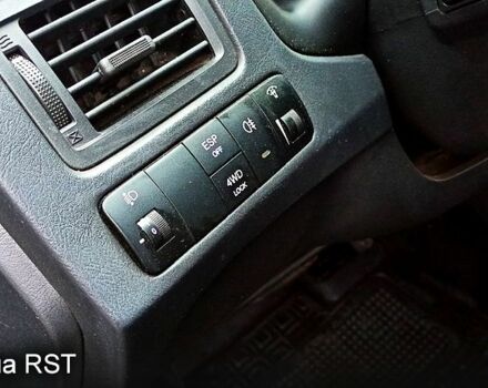 Чорний Хендай Туксон, об'ємом двигуна 2 л та пробігом 188 тис. км за 8800 $, фото 10 на Automoto.ua