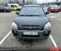 Чорний Хендай Туксон, об'ємом двигуна 2 л та пробігом 106 тис. км за 8350 $, фото 1 на Automoto.ua
