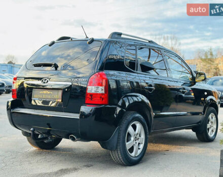 Чорний Хендай Туксон, об'ємом двигуна 2 л та пробігом 186 тис. км за 8300 $, фото 9 на Automoto.ua