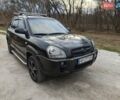 Черный Хендай Туксон, объемом двигателя 2 л и пробегом 182 тыс. км за 9000 $, фото 1 на Automoto.ua
