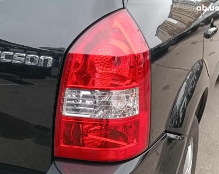 Чорний Хендай Туксон, об'ємом двигуна 2 л та пробігом 192 тис. км за 7990 $, фото 8 на Automoto.ua