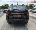 Черный Хендай Туксон, объемом двигателя 2 л и пробегом 137 тыс. км за 8400 $, фото 4 на Automoto.ua